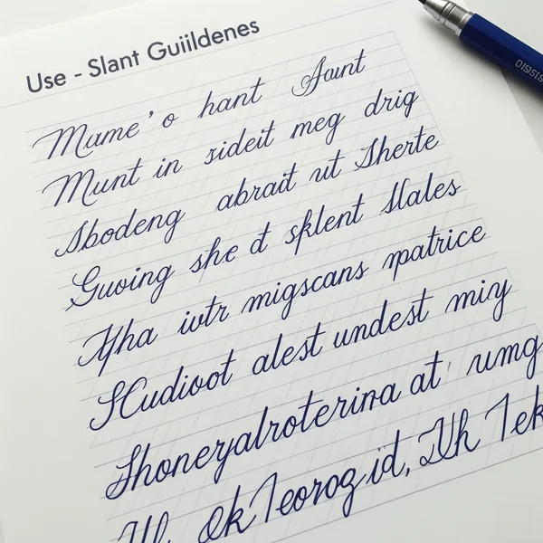 Cursive writing with consistent slant lines guide example